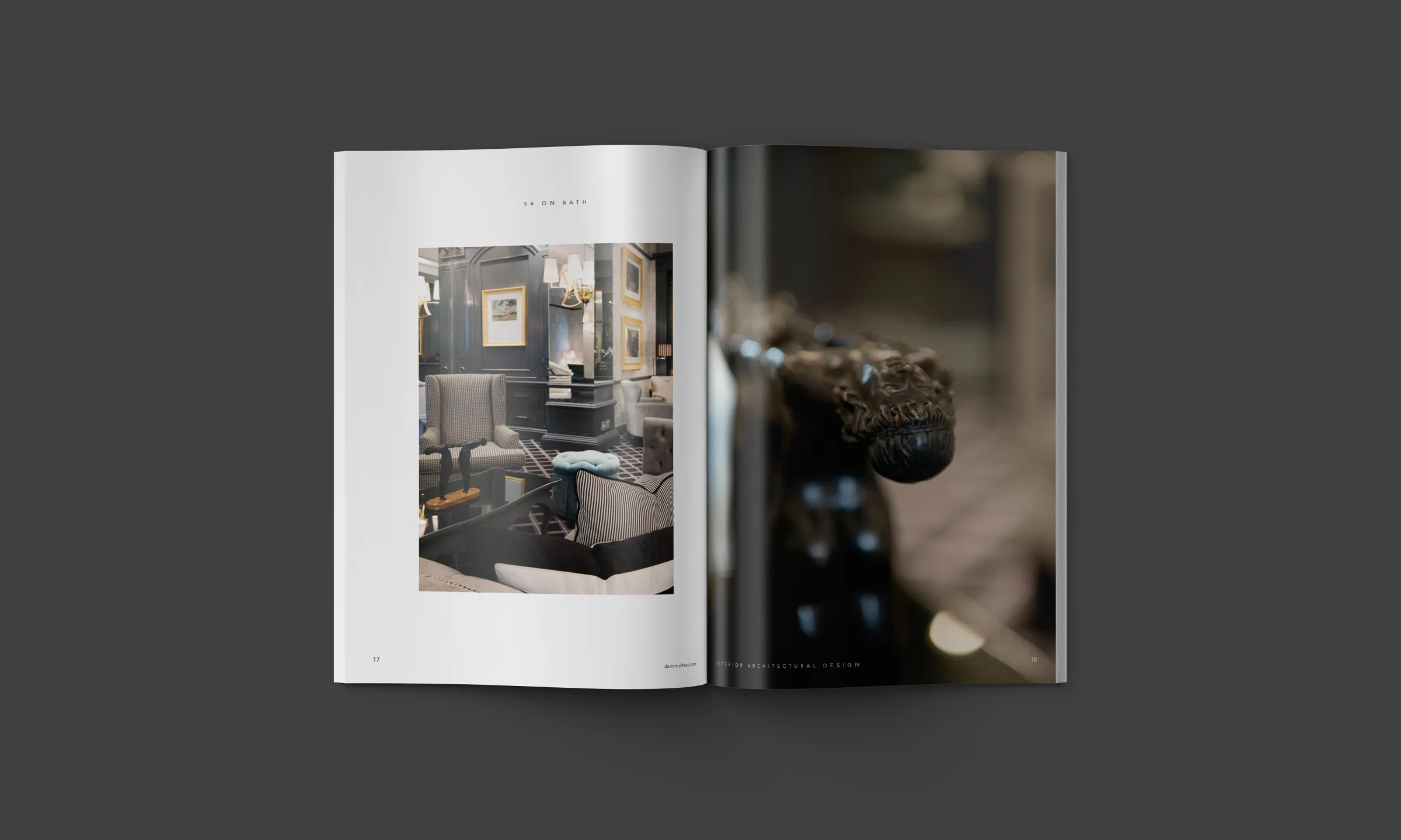 A hotel restaurant in the book: red patterned walls, white linen, chequered marble floor.