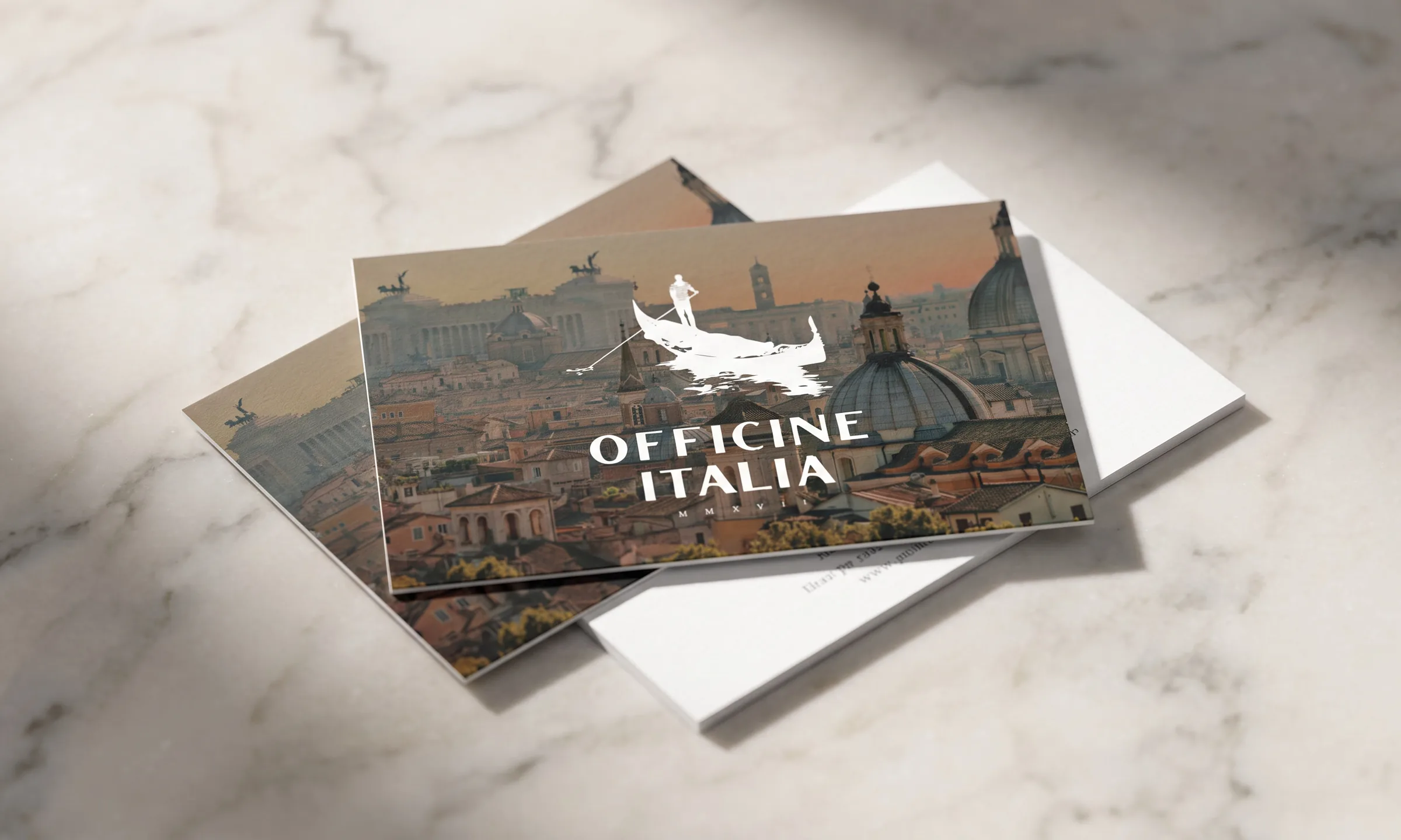 The gondola and gondolier alone, in black, above a broken reflection.