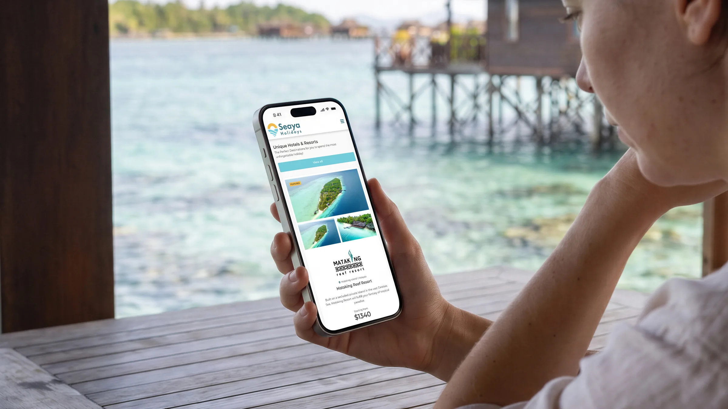 A close crop of the wireframes: the resort page sketched by hand, rooms and packages side by side, a booking button on every room.