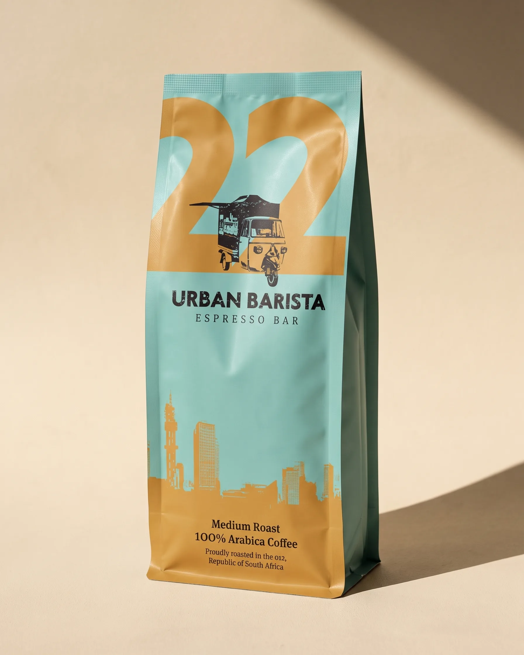 A single No. 22 bag in teal and ochre, the Pretoria skyline along its foot.