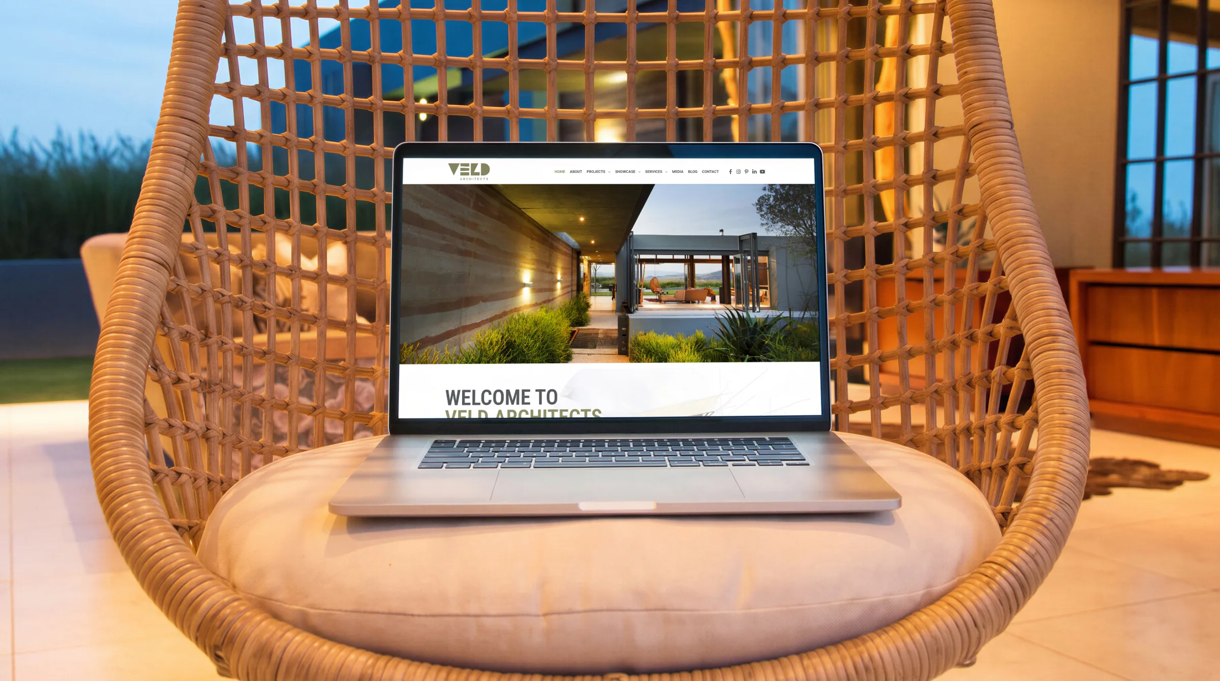 The home page, opening on an aerial photograph of a finished house.